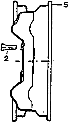 Cross-section of a wheel with a rivetted spacer. Part 1 is bolt, part 2 is rivetted spacer.
