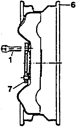 Cross-section of a wheel with a rivetted spacer. Part 1 is bolt, part 7 is rivetted spacer.
