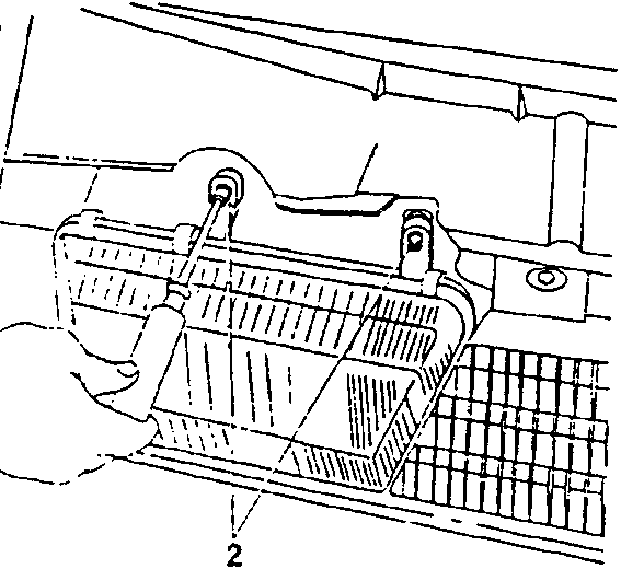 Illustrates removal of glove box latch mechanism using screwdriver